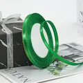 Deep green satin ribbon with gold edges on white spool for elegant gift packaging - 19# Green