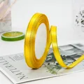 Bright yellow satin ribbon with gold metallic edges for gift wrapping and DIY crafts - Gold Yellow