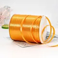 Roll of bright orange-yellow satin ribbon with gold metallic edge for gift wrapping - Orange With Gold Trim 450m X 0.6cm