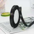 1cm black satin ribbon roll with gold metallic edge for gift wrapping and DIY crafts - Black