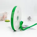 Nastro canneté verde da 1,5 cm per confezioni floreali e regali con trama a coste - Verde