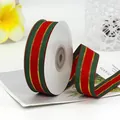 Red and green striped Christmas ribbon with gold edges on a roll for gift wrapping - Extra Wide Width Style