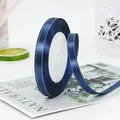 Dark blue satin ribbon with gold stitched edges for gift wrapping and DIY crafts - Dark Blue