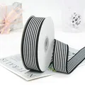 2.5cm wide black and white striped grosgrain ribbon roll for gift wrapping and hair bows - Black