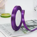 1cm purple satin ribbon with gold edge for gift packaging and DIY crafts on a roll - Purple