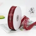 Burgundy decorative ribbon with white FOREVER LOVE printing on white plastic spool - FOREVER LOVE / Burgundy