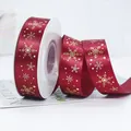 Burgundy Christmas ribbon with golden glitter snowflakes on a white spool roll - Burgundy Snowflake