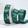 Dark green Christmas ribbon with gold Merry Christmas print and festive patterns - Green Festive Text Pattern