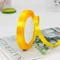 Vibrant yellow 6mm satin ribbon roll for gift wrapping and DIY crafts decor - Gold Yellow