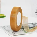 Golden 2cm sheer organza ribbon roll for gift wrapping and DIY crafts projects - Tan