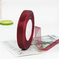 Roll of 1.5cm burgundy sheer organza ribbon for gift wrapping and DIY crafts - Burgundy