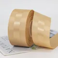 Nastro in grosgrain color oro champagne con trama a rilievo per confezioni regalo - Oro chiaro
