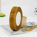 Rotolo di nastro di organza giallo dorato per confezioni regalo e fai da te - Marrone