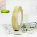 Champagne gold organza ribbon roll with semi-transparent woven texture for gift wrapping - Apricot