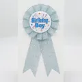 Badge ruban Birthday Boy bleu pailleté avec motifs étoiles et bords plissés - Bleu clair