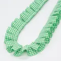 Green and white checkered ruffled ribbon with elegant pleated edges for DIY sewing projects - Green