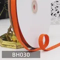 1cm orangefarbenes Baumwoll Fischgrätband auf weißer Spule zum Nähen - Oranger Stil (BH030)