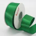 Deep green satin ribbon 4cm wide on white spool for gift wrapping and floral bows - Green