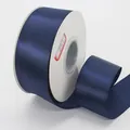 Dark blue satin ribbon with gold glitter finish on a white round cardboard spool - Dark Blue