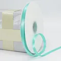 Roll of 1cm teal satin polyester ribbon for gift wrapping and floral decoration - Aqua Blue
