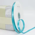 Peacock blue 1cm polyester satin ribbon on spool for gift wrapping and floral bouquets - Teal