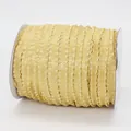 Nastro a balze giallo champagne in poliestere con texture litchi su rocchetto - Oro (693)