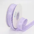 Light purple ruffled polyester ribbon with lychee texture on a white round spool - Light Purple