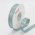 1.5cm wide ice blue metallic ribbon roll with glossy woven texture and 308# color label - 1.5cm / Teal Blue