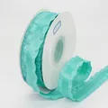 Roll of teal polyester pleated ribbon with ruffle edges for floral and DIY hair accessory - Teal Blue