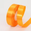 Polished orange polyester satin ribbon roll for gift wrapping and wedding decor - 1.5cm x 22m / Orange