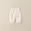 Kids casual cotton pants in cream color with elastic waist and ribbed cuffs for spring - 73cm / Cream (Pants)