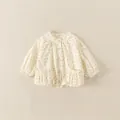 Cute cream floral cotton jacket for baby girls featuring ruffle pockets and button closure - 90cm / Beige