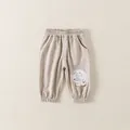 Beige baby knit joggers with elastic waist and cute cartoon bear happy patch - Brown / 73cm