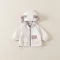 Kinder Windjacke mit Kapuze in Beige mit lila Akzenten und süßem Welpenmotiv - 73cm / Beige