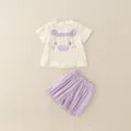 Süßes Sommer-Set für Kleinkinder mit beigem Comic-T-Shirt und lila kurzer Hose - 80cm / Lila
