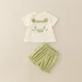 Süßes Baby-Mädchen Sommerset mit beige Monster T-Shirt und grüner Baumwollshorts - 80cm / Grün