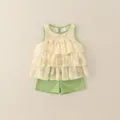 Girls summer two-piece outfit featuring green sleeveless floral top and matching shorts - 80cm / Green