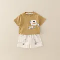 Sommer-Set für Jungen mit senfgelbem Cartoon-T-Shirt und elfenbeinfarbenen Shorts - 80 / Khaki