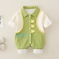 Green dinosaur baby romper in waffle fabric with contrast sleeves and snaps - 66 / Green