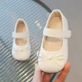 White Mary Jane shoes for girls with quilted pattern and decorative bow detail - EU 21 / White