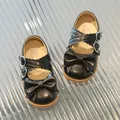 Black Mary Jane shoes for girls featuring a large bow and double silver buckle straps - Size 16 (Inner Length 11.9cm) / Black