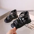 Classic black Roman sandals for girls featuring multi-layer cross straps and a thick rubber sole - EU 23 / Black