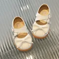 Girls pearl white Mary Jane shoes with large bow and wavy cross straps design - Size 16 (Inner Length 11.9cm) / Off White