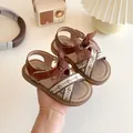 Sandali bimba in pelle marrone con cinturini floreali e fiocco in rete morbida - EU 21 / Marrone Scuro