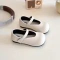 Classic white Mary Jane shoes for girls with adjustable strap and durable leather finish - EU 21 / Off White