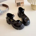 Classic black patent leather Mary Jane shoes for girls with durable thick rubber soles - Size 26 / Black