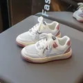 Kids' breathable mesh running sneakers in white and pink color block design - EU 27 / Pink
