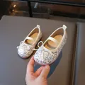 Silver glitter Mary Jane flats for girls with bow tie and elastic strap detail - Size 21 (13.2cm) / Gold