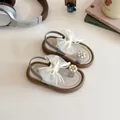 Fashionable cream and grey girls' flat sandals with large mesh bow and pearl floral accent - EU 21 / Silver