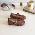 Detail of brown Mary Jane leather shoes for girls featuring vintage hollow-out patterns - 23-26 / Brown